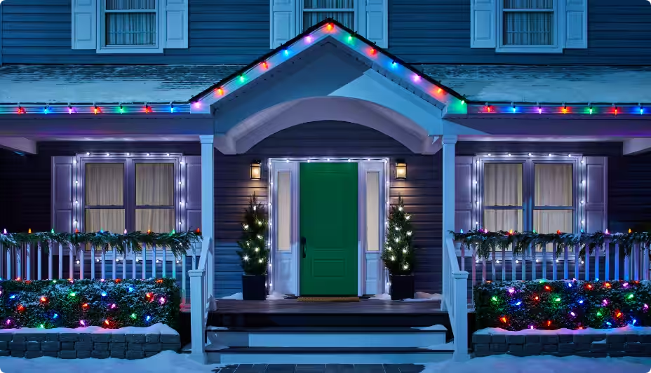 Outside of a house decorated with colourful NOMA Christmas lights.