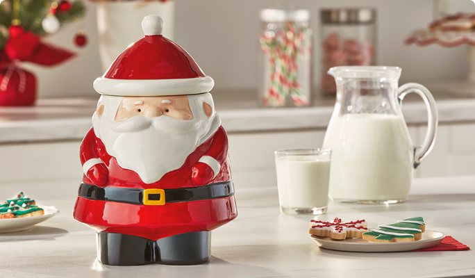 Un pot à biscuits Père Noël CANVAS sur un comptoir de cuisine.