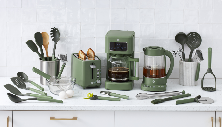 A set of various matching earthy, green-coloured kitchen appliances. 