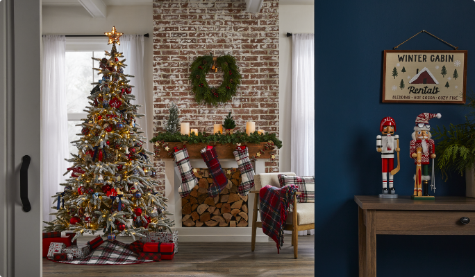 A living room with a Christmas tree and CANVAS Canadian Christmas decorations.