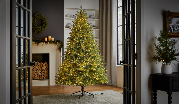 A NOMA Taylor Twinkle Tree in a living room.