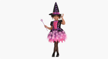 A girl wearing  a Child Light-Up Sparkle Witch Costume. 