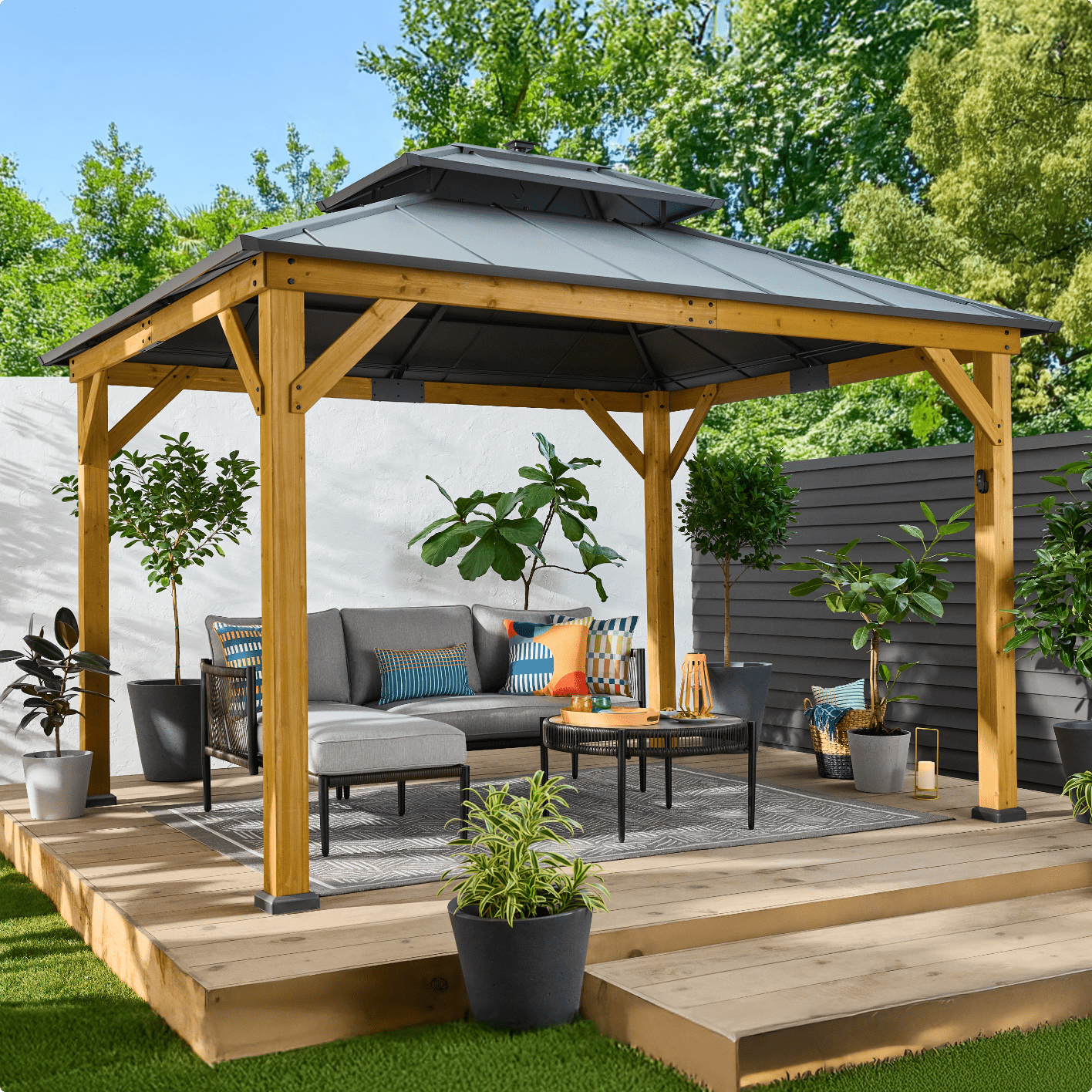 CANVAS Aurora Gazebo-With its responsibly-sourced wood frame and solar LED lights, you can relax in style, any time of day.