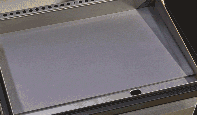 A gif showing pancakes being cooked differently on the 2 different heat zones.