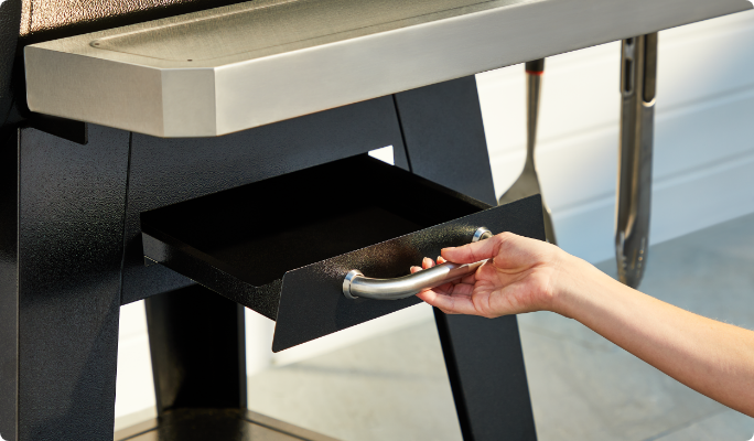 A close up shot of the front access grease tray.