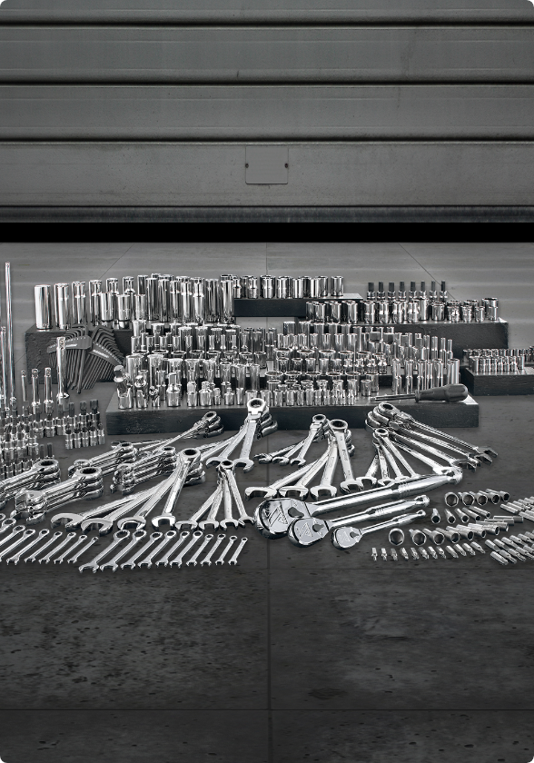 A 500-piece MAXIMUM Master Socket & Wrench Set arranged on a workshop floor.