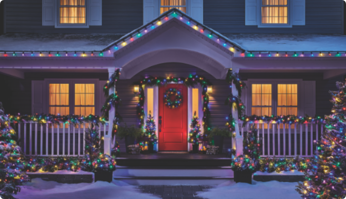 Exterior of a home decorated with colourful NOMA Advanced EverTough LED Christmas Lights