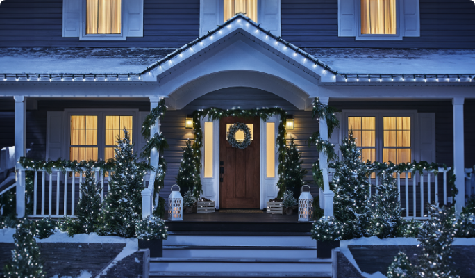 Front porch of home decorated with NOMA Advanced Constant-Lit LED Lightshow 2.0