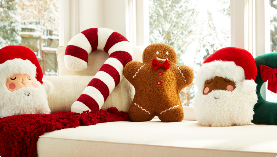 Living room decorated with Christmas tree and CANVAS Christmas decor