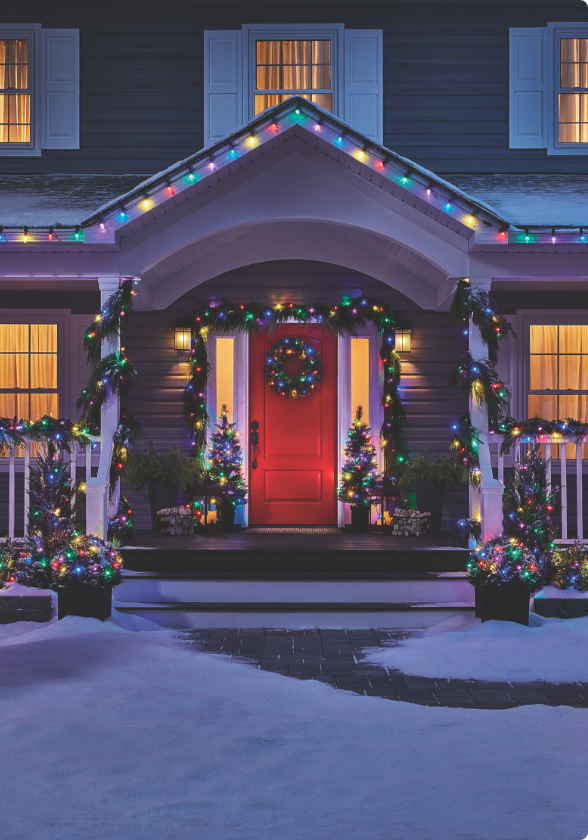 The exterior of a home decorated with NOMA Christmas lights. 