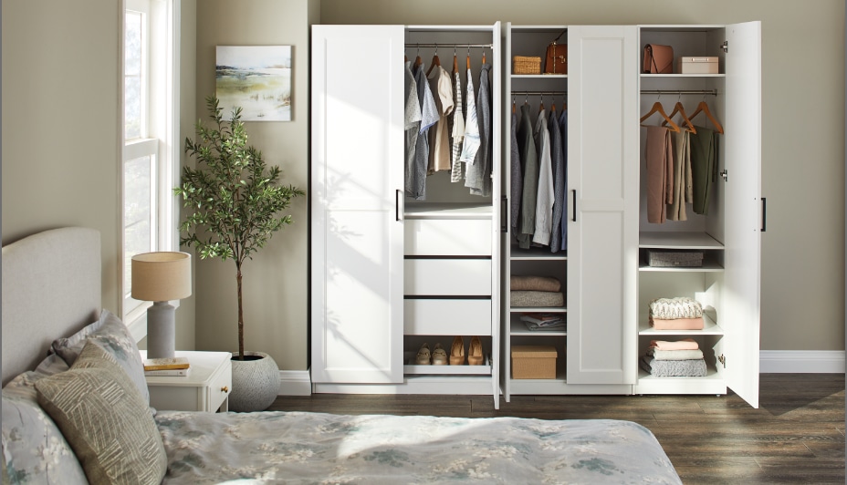 A CANVAS wardrobe with organized clothes and storage in a bedroom.