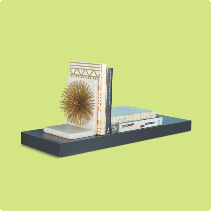 A type A decorative shelf with books and bookends.