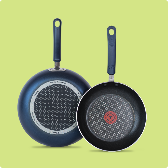 Two non-stick T-fal frying pans.