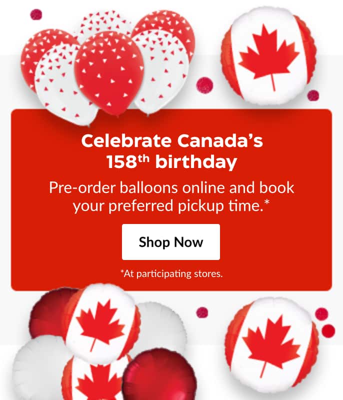 Red and white balloons featuring the Canadian flag and maple leaf design.