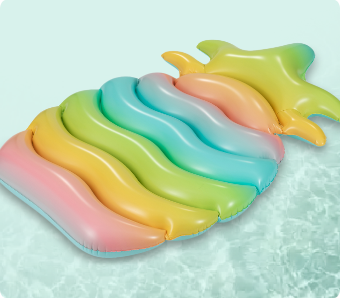A colourful pool float in the water.