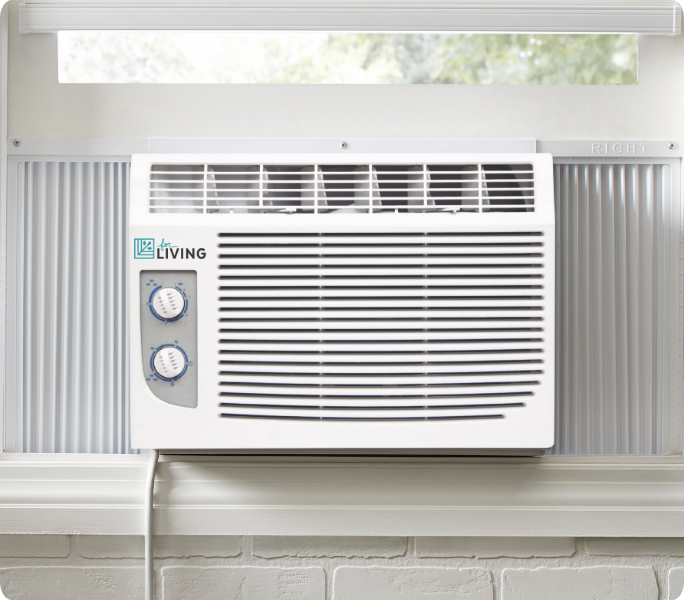 A window air conditioner installed and running.