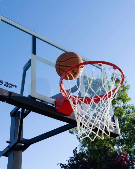 A basketball hoop with ball.