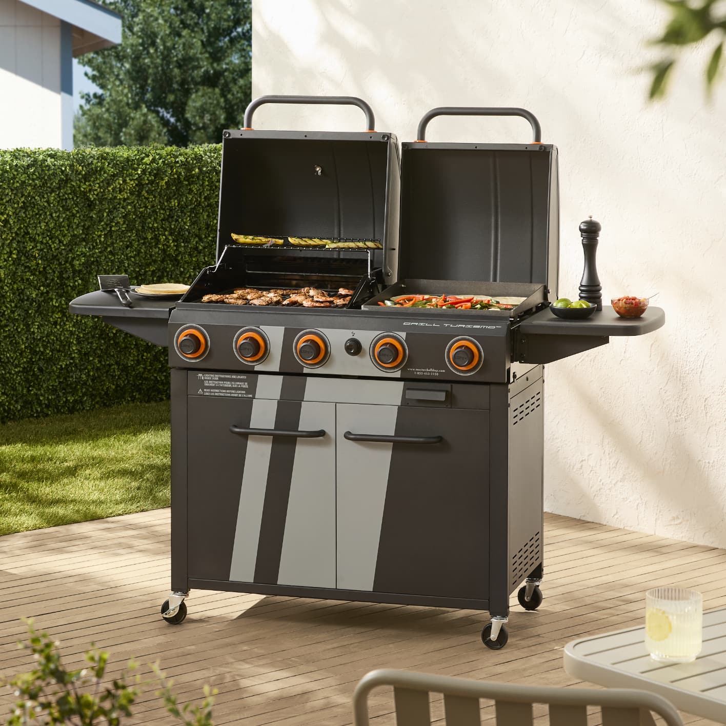 A MASTER Chef Grill Turismo Grill & Griddle Combo cooking a variety of foods on a sunny patio.