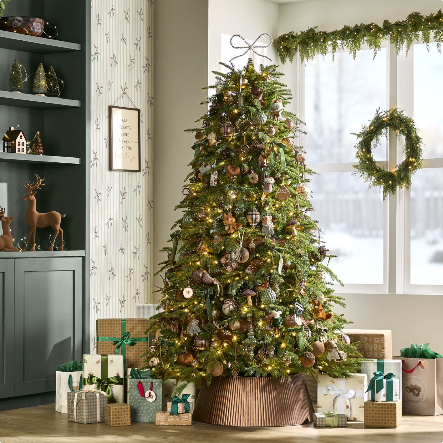 Various CANVAS Blossom Twinkle Trees and CANVAS Twinkling Birch Stake Lights on display in a snowy yard at night. 