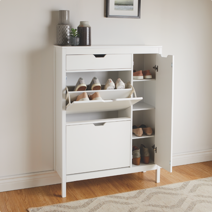 White hutch cabinet with open shelves and a drawer, storing kitchen items.