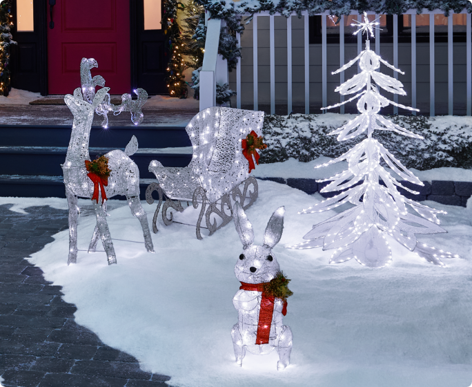 Une scène hivernale avec des bonshommes de neige et des ours polaires illuminés de la collection Arctique de CANVAS.