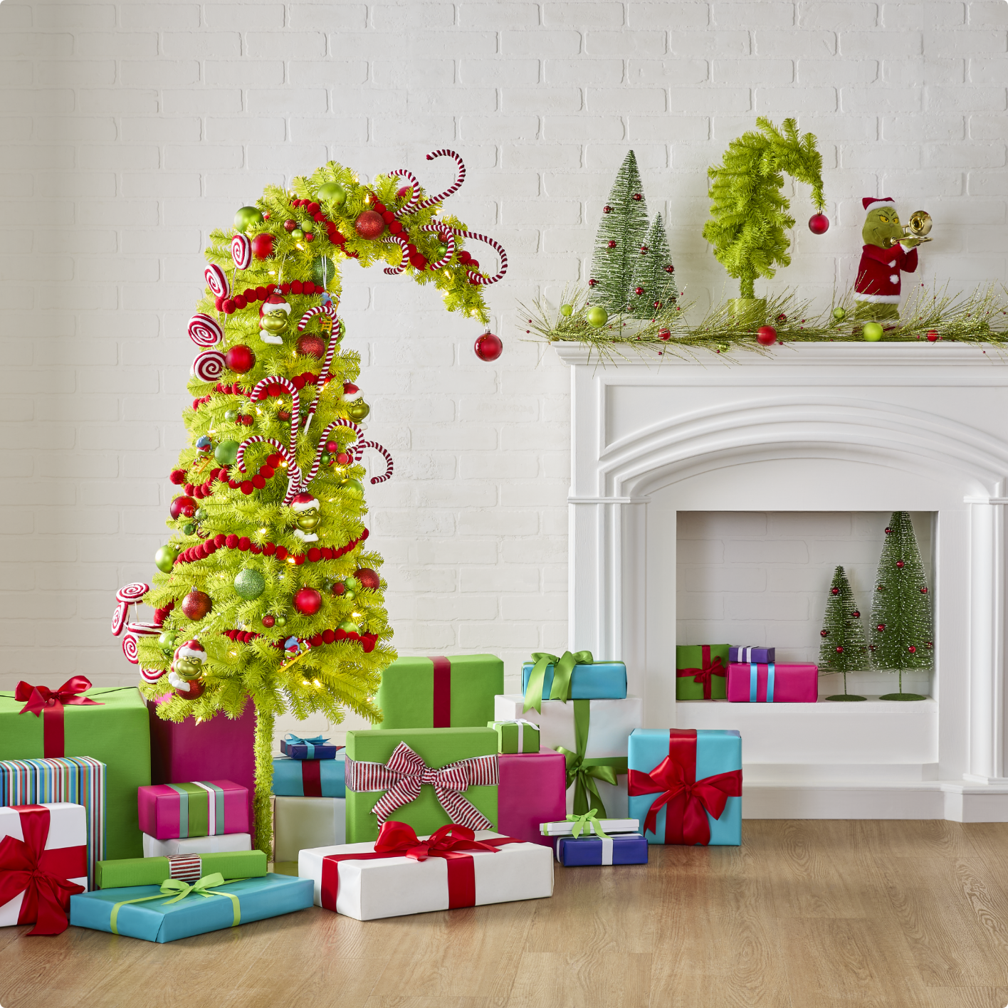 Whimsical, Ginch-themed Crumpit Christmas tree decorated with ornaments, surrounded by colorful presents in a bright room with holiday decor.