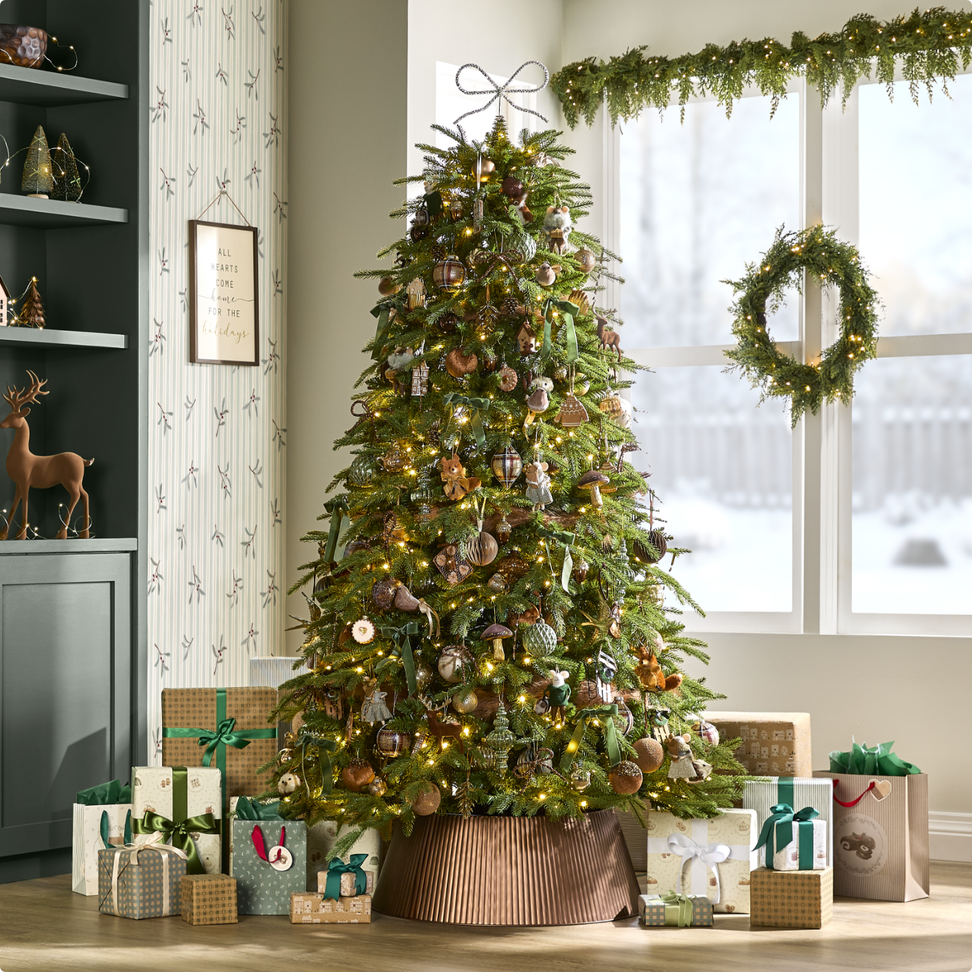 Decorated Christmas tree with presents underneath in a cozy room, featuring wreaths and holiday decorations.