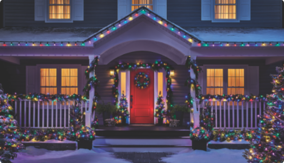 Outside of a house decorated with colourful NOMA Christmas lights.