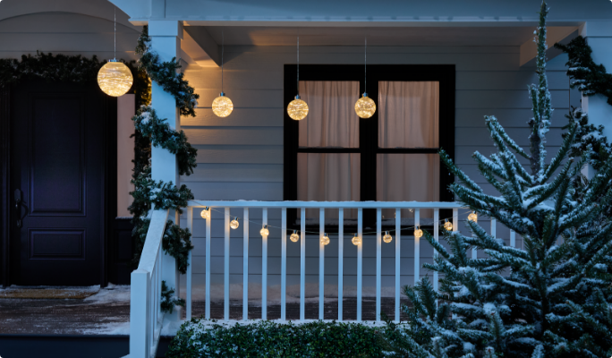 NOMA Ultra Bright decorations in a snowy yard.