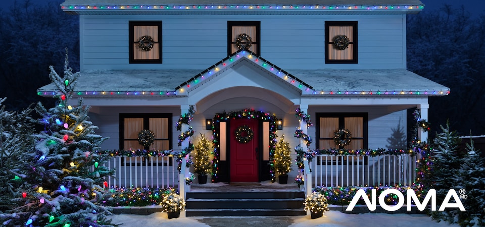 Exterior of a home decorated with colourful NOMA Advanced EverTough LED Christmas Lights