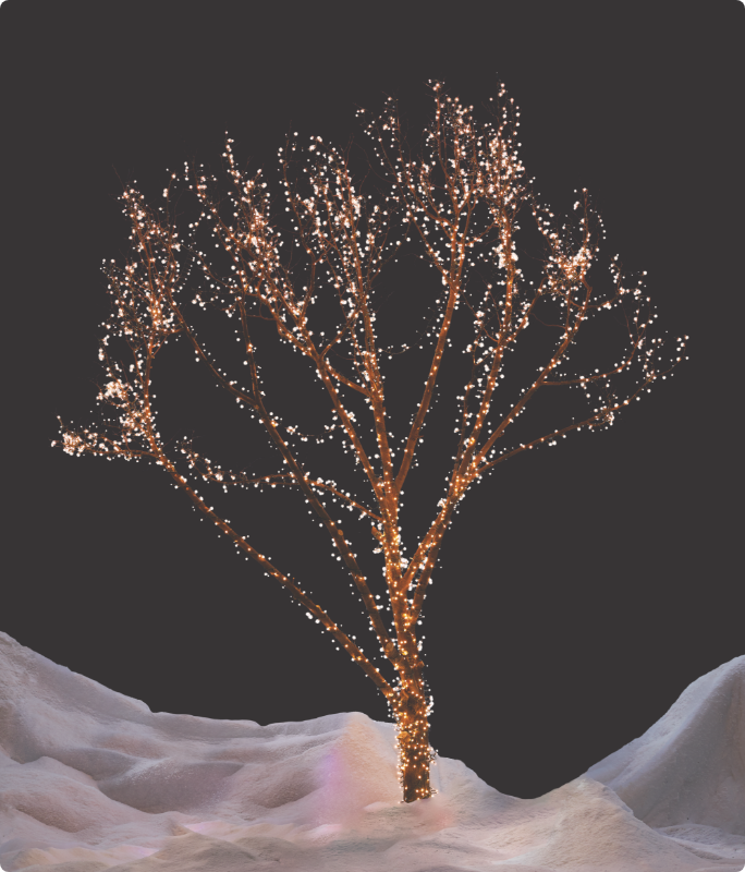 A tree decorated with warm white NOMA Advanced Cluster Lightshow LEDs.