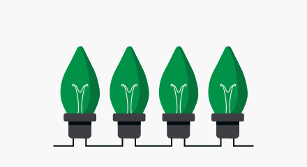  An icon of 3 green Christmas lights.