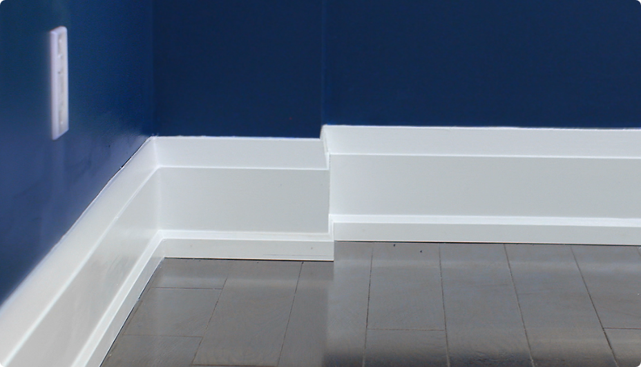 Blue wall with white trim.