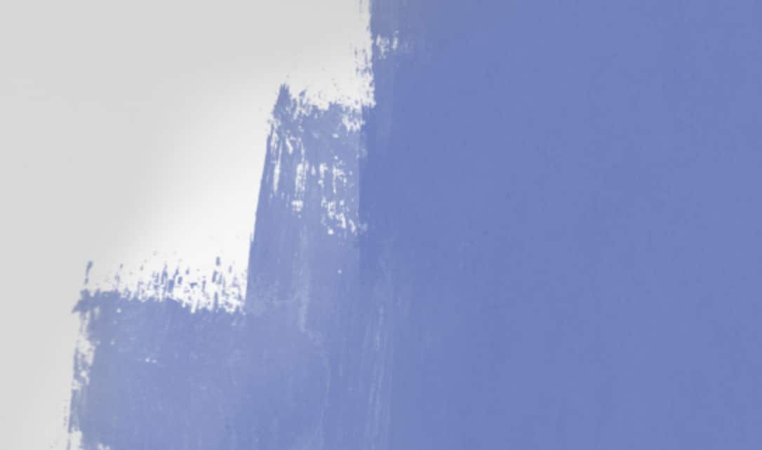 A wall partially painted blue.