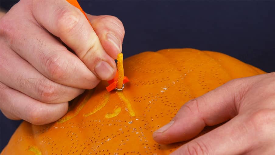 How to carve a pumpkin scraping 06