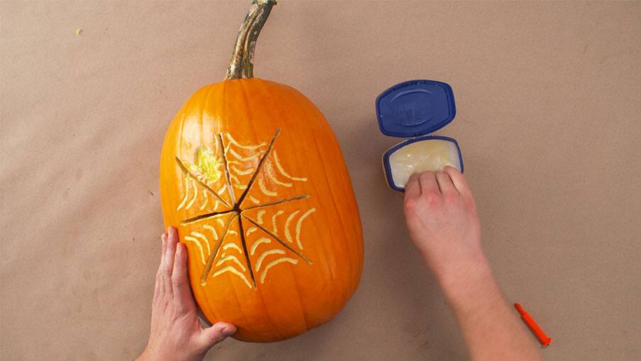 How to carve a pumpkin scraping 07