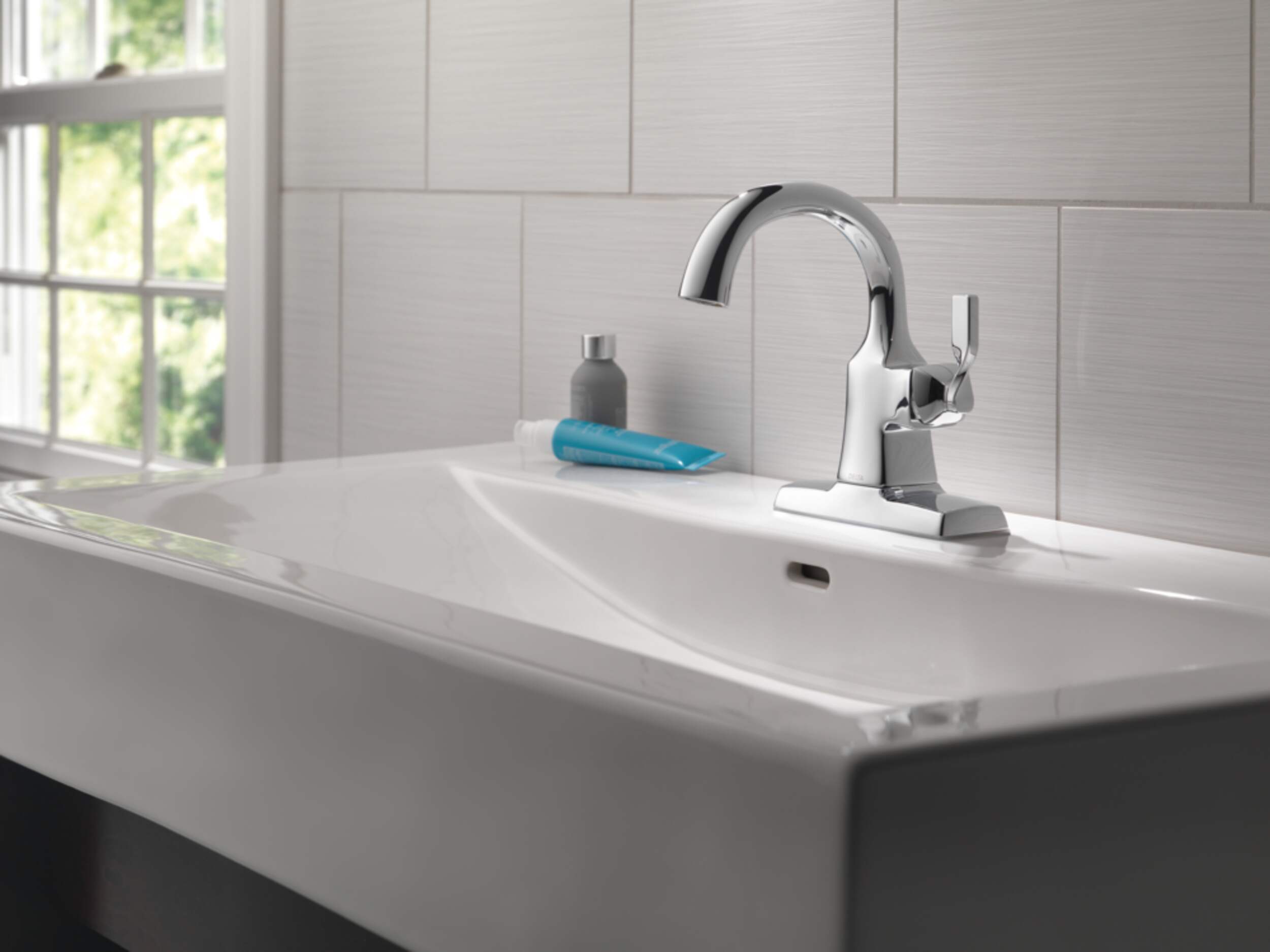 Delta Faucet Sawyer Single Handle High Arc Single Hole 4-in Centerset Bathroom Sink Faucet, WaterSense®&nbsp;Certified, Chrome Front_Angled_Left