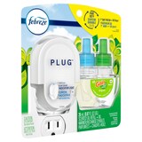 Febreze Scented Oil Air Freshener Kit, Fade Defy, Includes Plug-In Warmer and Refill, Assorted Scents Front_Angled_Right