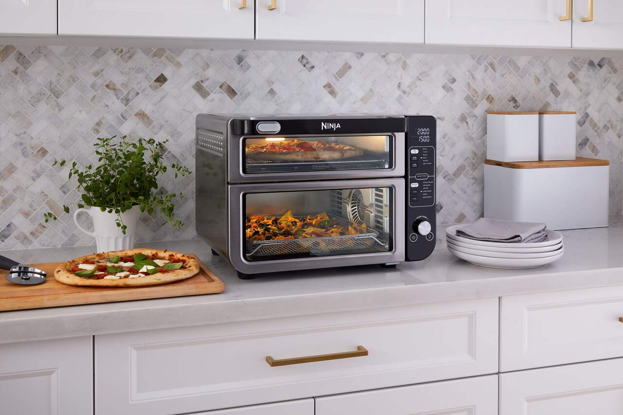 https://media-www.canadiantire.ca/product/living/kitchen/kitchen-appliances/0430324/ninja-double-door-oven-12-functions-air-fry-7a1a24b0-77ac-4dd2-baa9-5fd279b3306a-jpgrendition.jpg?imdensity=1&imwidth=1244&impolicy=mZoom