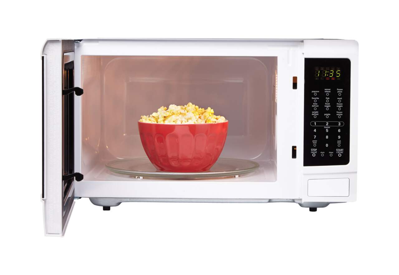 1.6 cu ft 1100W Stainless Steel Microwave Oven by Magic Chef at