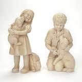 Statue, enfant avec chiot