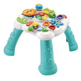 VTech Touch & Explore Activity Table with Sit-to-Stand Play, English, Ages 6+ months Front_Three_Fourths_Angled_Left