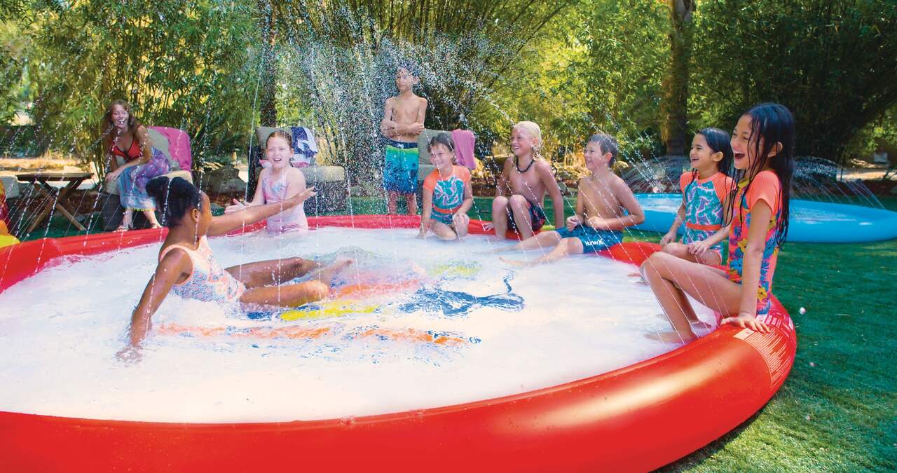 WOW Super Inflatable Large PVC Splash Pad with Soaker Sprinkler System,  Red, 10-ft