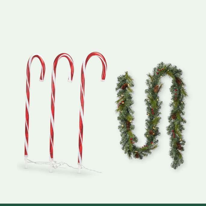 Three For Living Incandescent Candy Cane Stakes.  NOMA Pre-lit Garland with berries and pinecones, 9-ft 