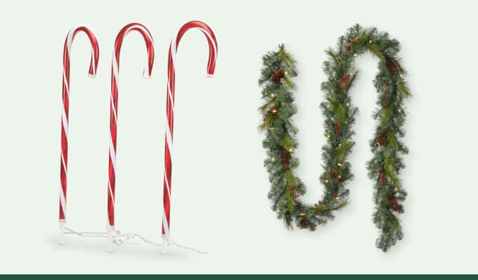 Three For Living Incandescent Candy Cane Stakes.  NOMA Pre-lit Garland with berries and pinecones, 9-ft 